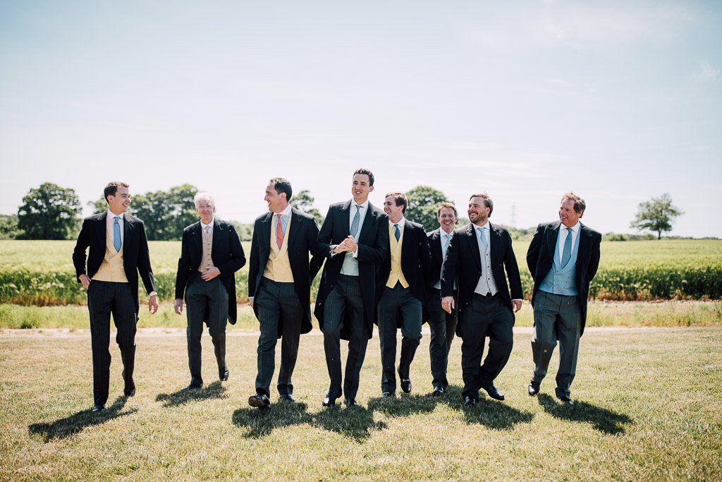 groom and groomsmen walking